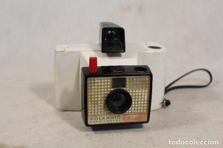 Polaroid swinger camara