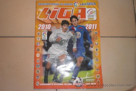 Sports collectibles: ALBUM CROMOS LIGA ESTE 2010-2011 VAC&Iacute;O CON 2 CROMOS nuevos