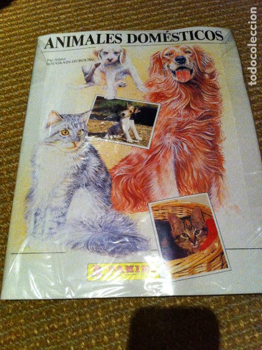 Collectionnisme Albums: Album de cromos vac&iacute;o Animales Dom&eacute;sticos de Panini + 50 sobres de 6 cromos sin abrir