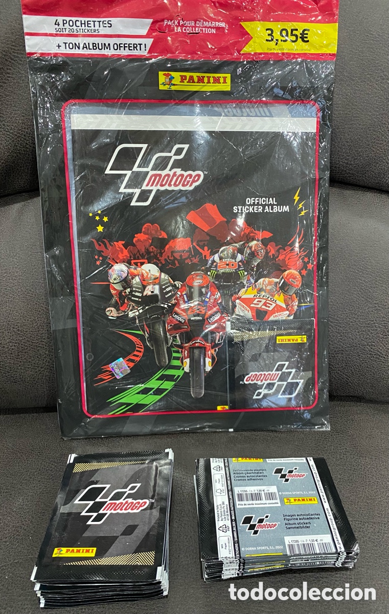 Colecionismo Cadernetas: Lote pack de inicio precintado con Album y dos sobres y 50 sobres de cromos MotoGP 2022. Panini