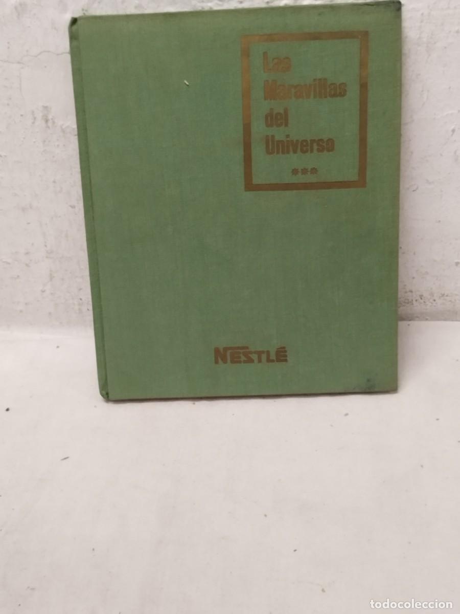 Coleccionismo &Aacute;lbumes: Antiguo album de cromos vacio con unos pocos de cromos. Las maravillas del universo 3 de Nestle.