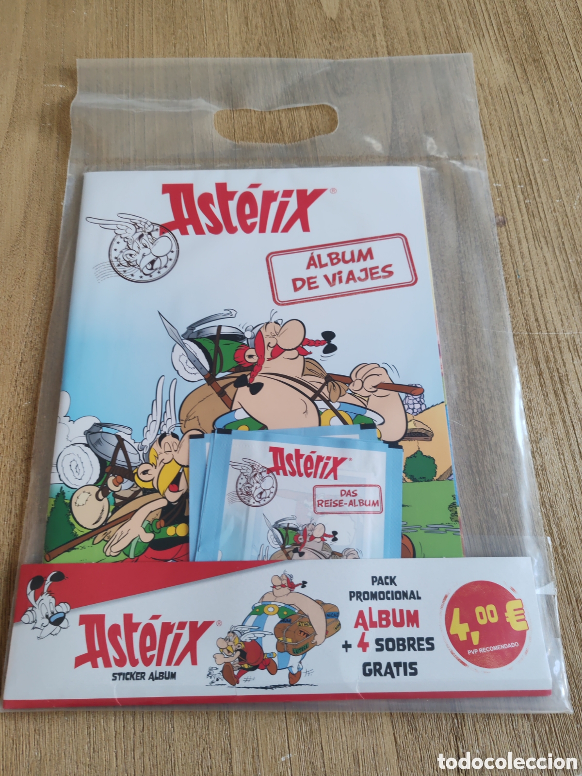 Coleccionismo &Aacute;lbumes: Ast&eacute;rix album de viajes + 4 sobres. Nuevo precintado