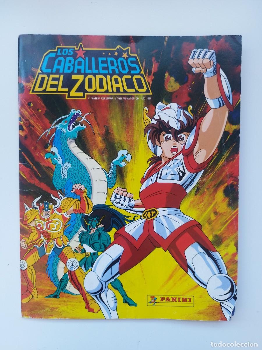 Coleccionismo &Aacute;lbumes: ALBUM DE CROMOS LOS CABALLEROS DEL ZODIACO + POSTER PANINI 1986 CONTIENE 224 DE 240 CROMOS