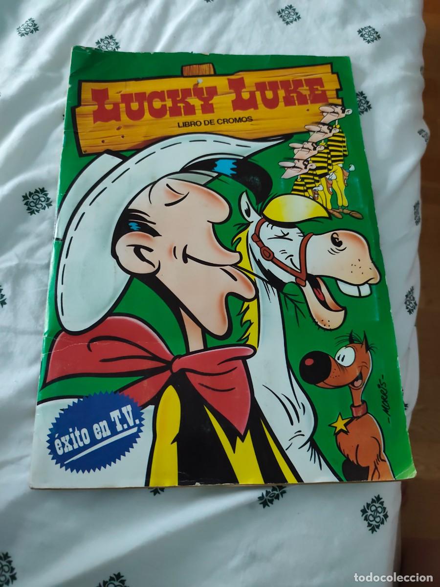 Coleccionismo &aacute;lbumes: LUCKY LUKE ALBUM EDITORIAL ESTE DARGAUD 1985 MORRIS EXITO T.V. Faltan 4 cromos