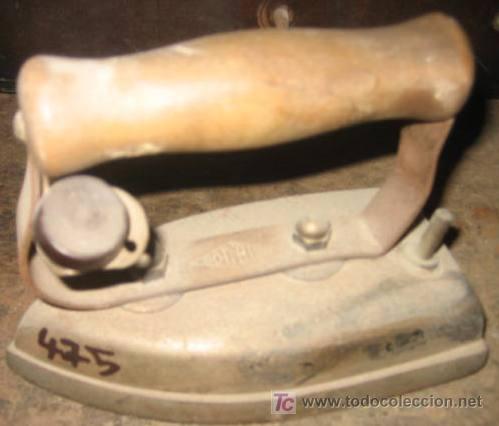 Antig&uuml;edades: Plancha de 15 cms de base - Foto 1