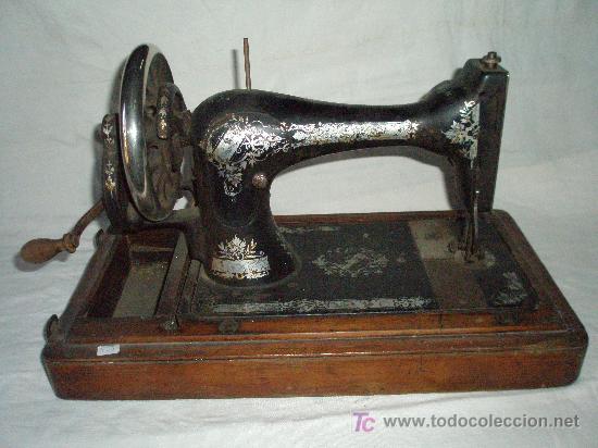 Antig&uuml;edades: MAQUINA COSER MANUAL MARCA SINGER - Foto 3