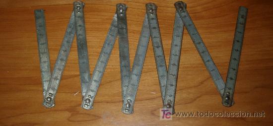 Antig&uuml;edades: ANTIGUO METRO METALICO PLEGABLE - Foto 1
