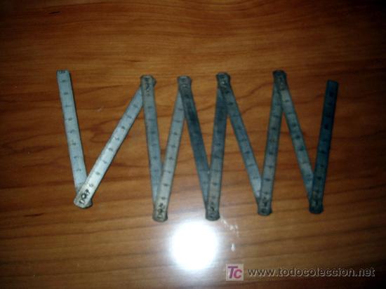 Antig&uuml;edades: ANTIGUO METRO METALICO PLEGABLE - Foto 2