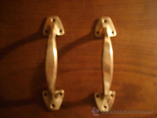 Antig&uuml;edades: DOS ASAS DE BRONCE MACIZO.- TIRADORES - 17 CM. - Foto 1