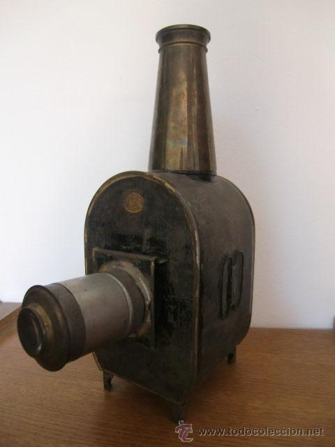 Antig&uuml;edades: Linterna m&aacute;gica marca E.P. con placas - Foto 1