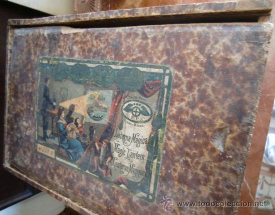 Antig&uuml;edades: Linterna m&aacute;gica marca E.P. con placas - Foto 16