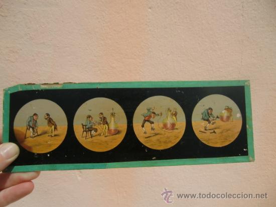 Antig&uuml;edades: Linterna m&aacute;gica marca E.P. con placas - Foto 24