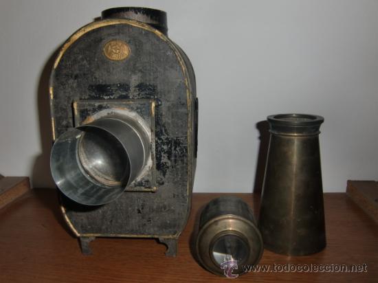 Antig&uuml;edades: Linterna m&aacute;gica marca E.P. con placas - Foto 7