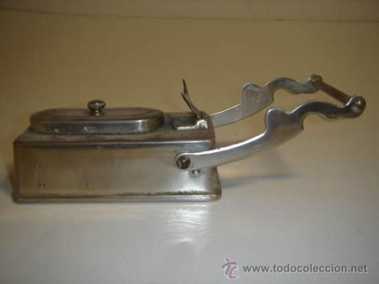 Antig&uuml;edades: ornillo para las tenacillas de ondular - Foto 1