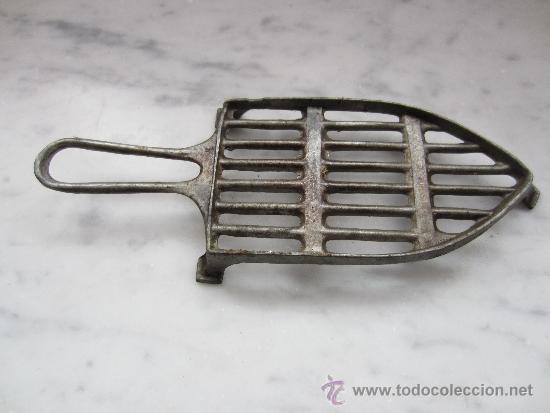 Antig&uuml;edades: reposa planchas - Foto 1