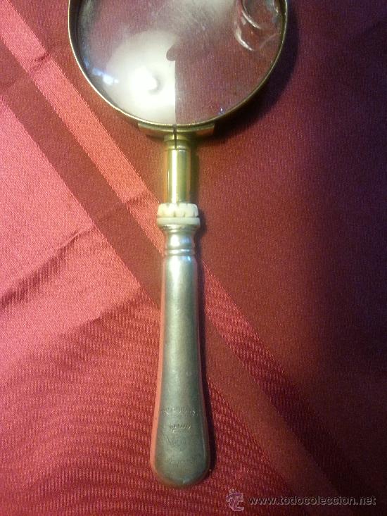 Antig&uuml;edades: Lupa de bronce y metal blanco con inscripcion - Foto 2