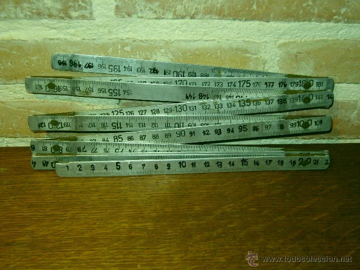 Antig&uuml;edades: METRO ANTIGUO DE CARPINTERO PLEGABLE DE ALUMINIO 2 METROS. - Foto 1