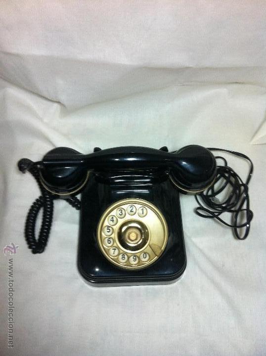 Tel&eacute;fonos: Telefono negro dorado funciona - Foto 1