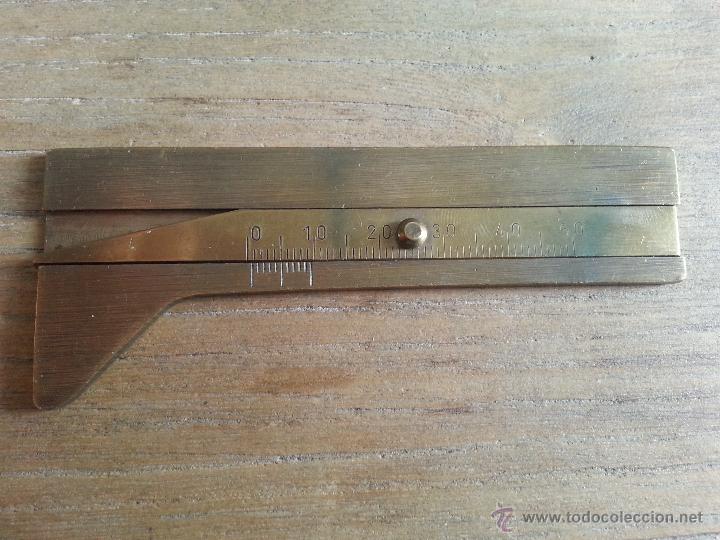 Antig&uuml;edades: ANTIGUO UTIL O CALIBRE DE METAL - Foto 1