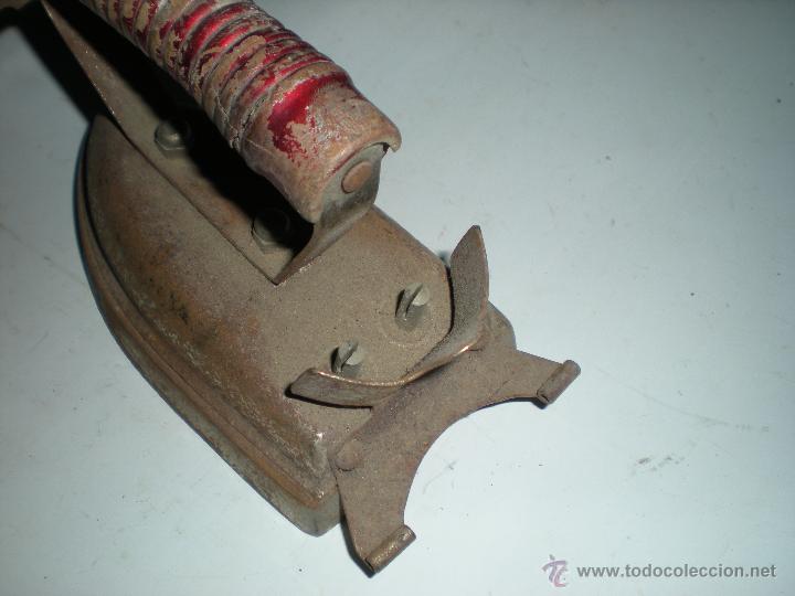 Antig&uuml;edades: Plancha el&eacute;ctrica sin cable - Foto 6