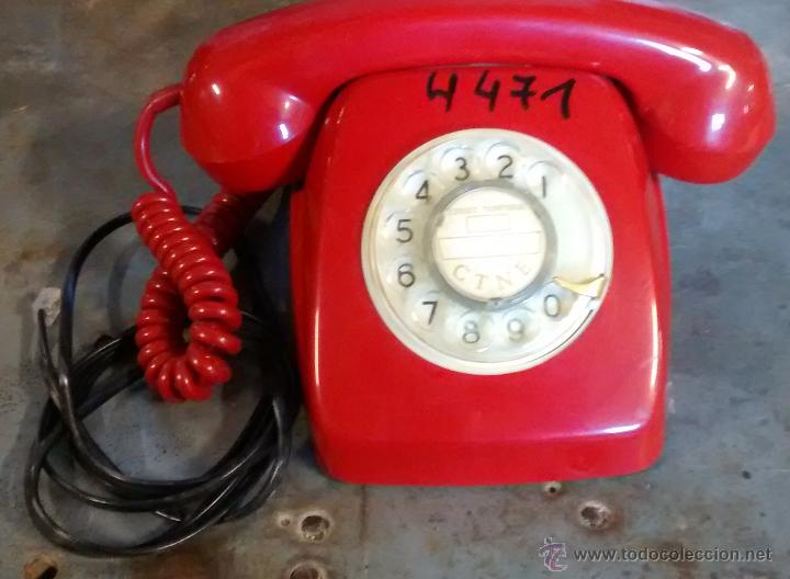 Tel&eacute;fonos: Tel&eacute;fono rojo, sin teclas, con n&uacute;meros en disco - Foto 1