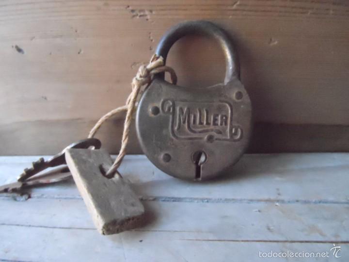 Antig&uuml;edades: CANDADO MILLER CON SU LLAVE FUNCIONA - Foto 1