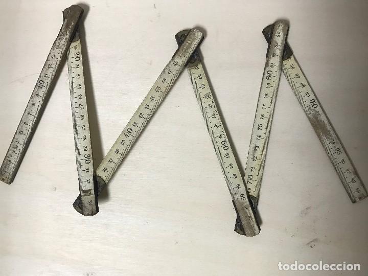 Antig&uuml;edades: METRO DE MADERA PLEGABLE DE CARPINTERO MARCA -METROS S.A.- - Foto 1
