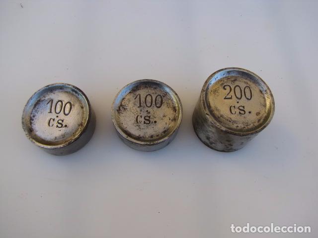 Antig&uuml;edades: Tres pesas apilables dos de 100 y una de 200 cs - Foto 2