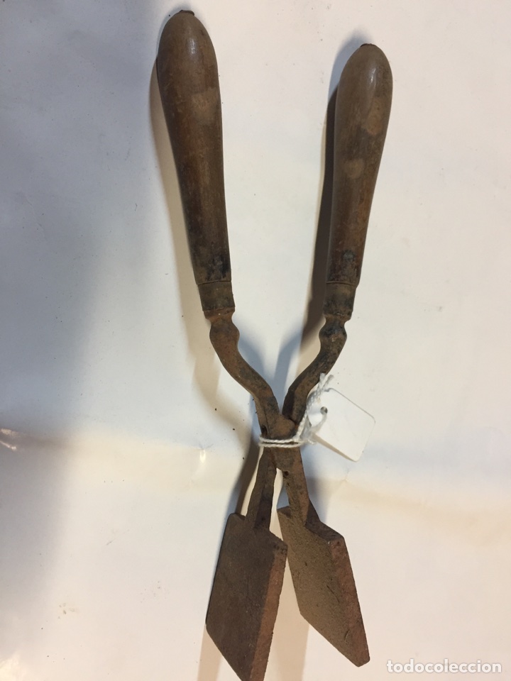 Antig&uuml;edades: Antigua plancha pelo ? - Foto 1