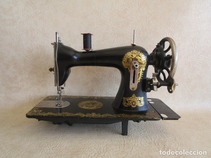 Antig&uuml;edades: antigua maquina de coser funciona! - Foto 2