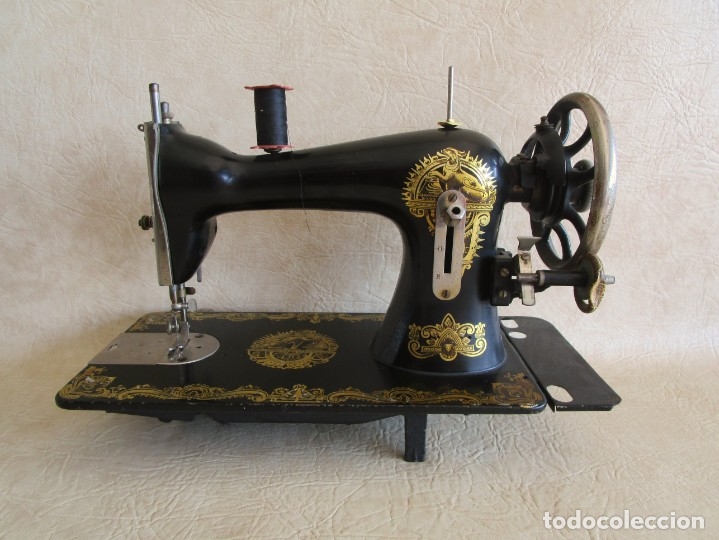 Antig&uuml;edades: antigua maquina de coser funciona! - Foto 1