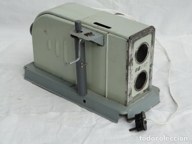 Antig&uuml;edades: PROYECTOR DE CINE NIC. - Foto 1