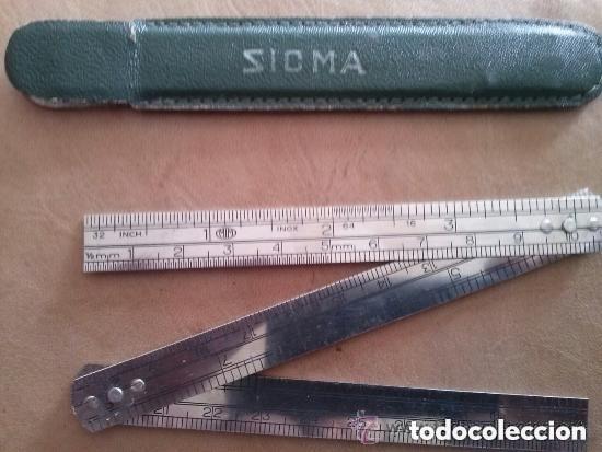 Antig&uuml;edades: Regla en inoxidable de la casa sicma con funda - Foto 1