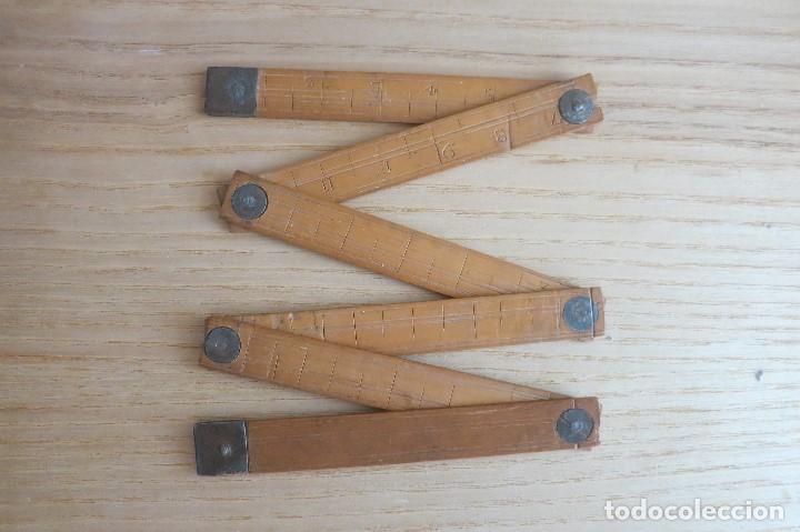 Antig&uuml;edades: metro de madera antiguo de 58 centimetros - Foto 1