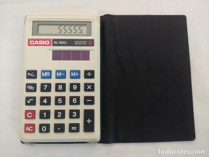 Antig&uuml;edades: CALCULADORA COLAR CASIO SL 300. - Foto 1