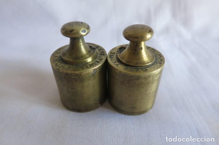 Antig&uuml;edades: dos pesas de 100 GRAMOS YSAURA - Foto 1