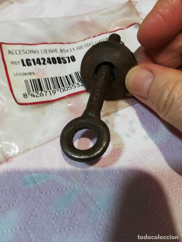 Antig&uuml;edades: C K. - Accesorio de cierre de arc&oacute;n de hierro. - Foto 1
