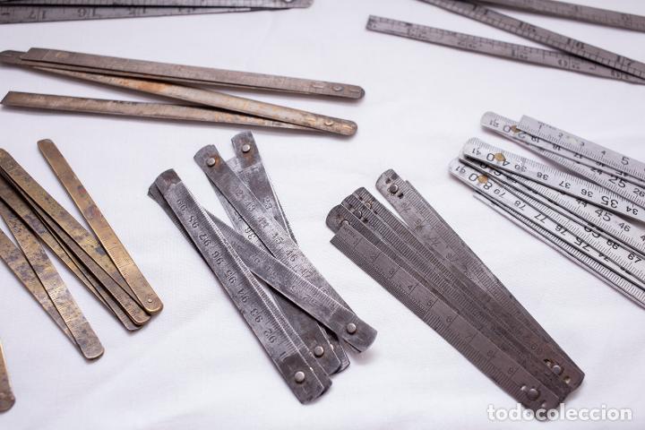 Antig&uuml;edades: Lote reglas plegables metal - Foto 2