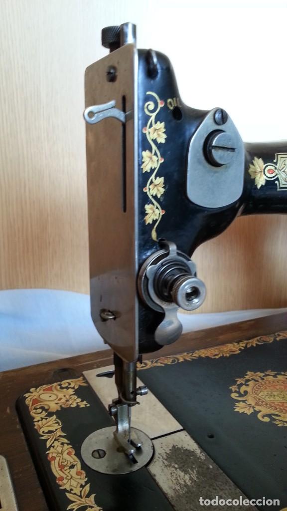 Antig&uuml;edades: M&aacute;quina de coser marca Jones. - Foto 8