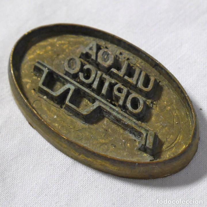 Antig&uuml;edades: Sello tamp&oacute;n de impresi&oacute;n en bronce Ulloa &Oacute;ptico - Foto 1