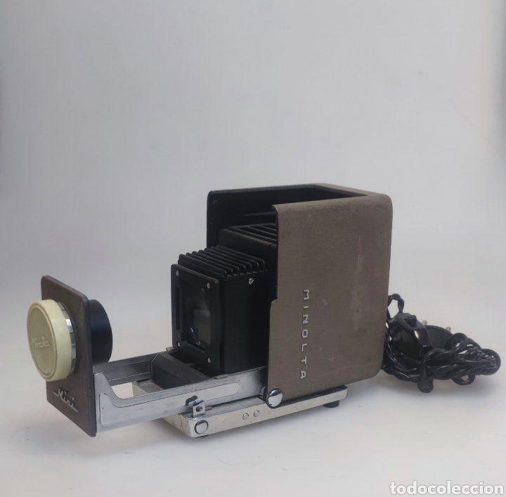 Antig&uuml;edades: Proyector diapositivas mini Minolta - Foto 2