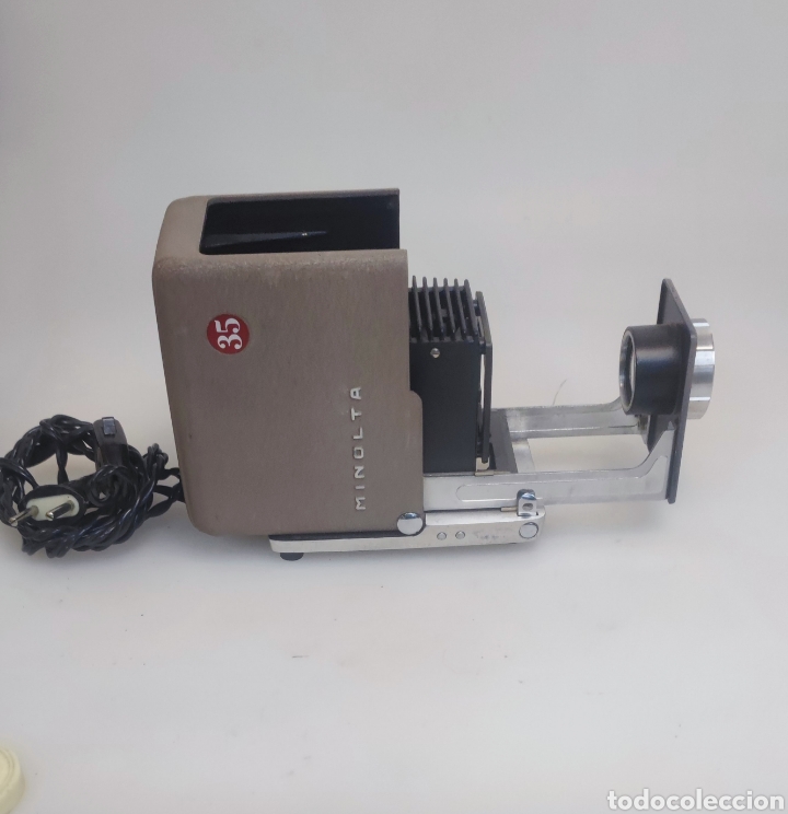 Antig&uuml;edades: Proyector diapositivas mini Minolta - Foto 4