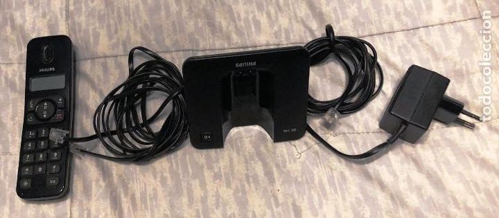 Tel&eacute;fonos: Tel&eacute;fono Philips modelo SE140, con cargador y base. - Foto 1