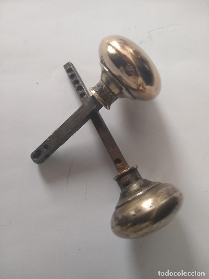 Antig&uuml;edades: Dos pomos de puerta bronce S.XIX