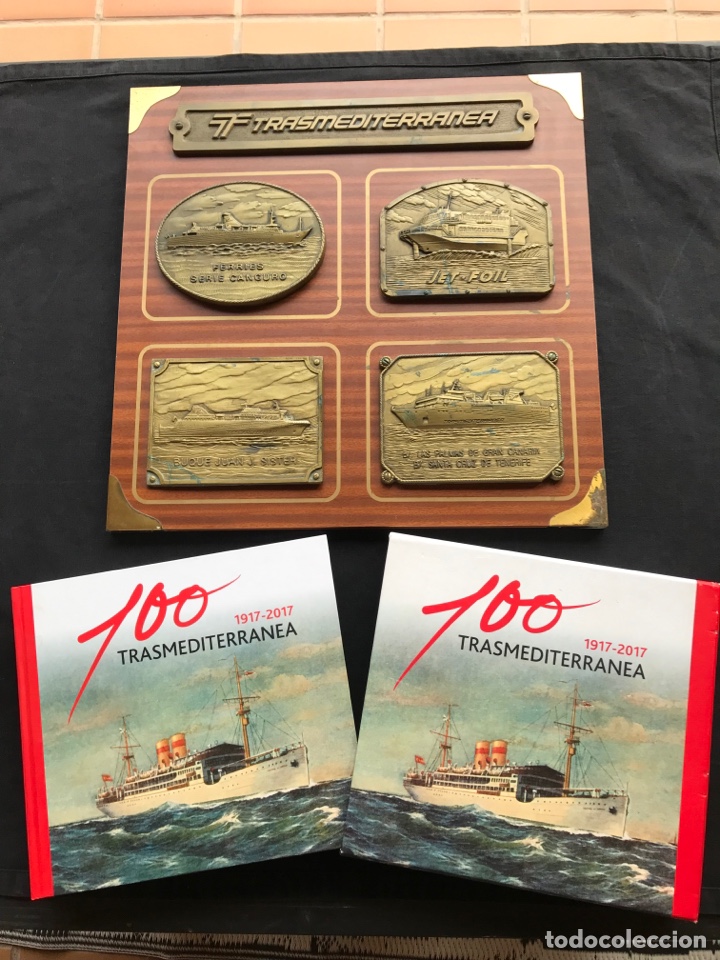Antig&uuml;edades: Libro 100 Trasmediterranea y cuadro peanas. - Foto 1