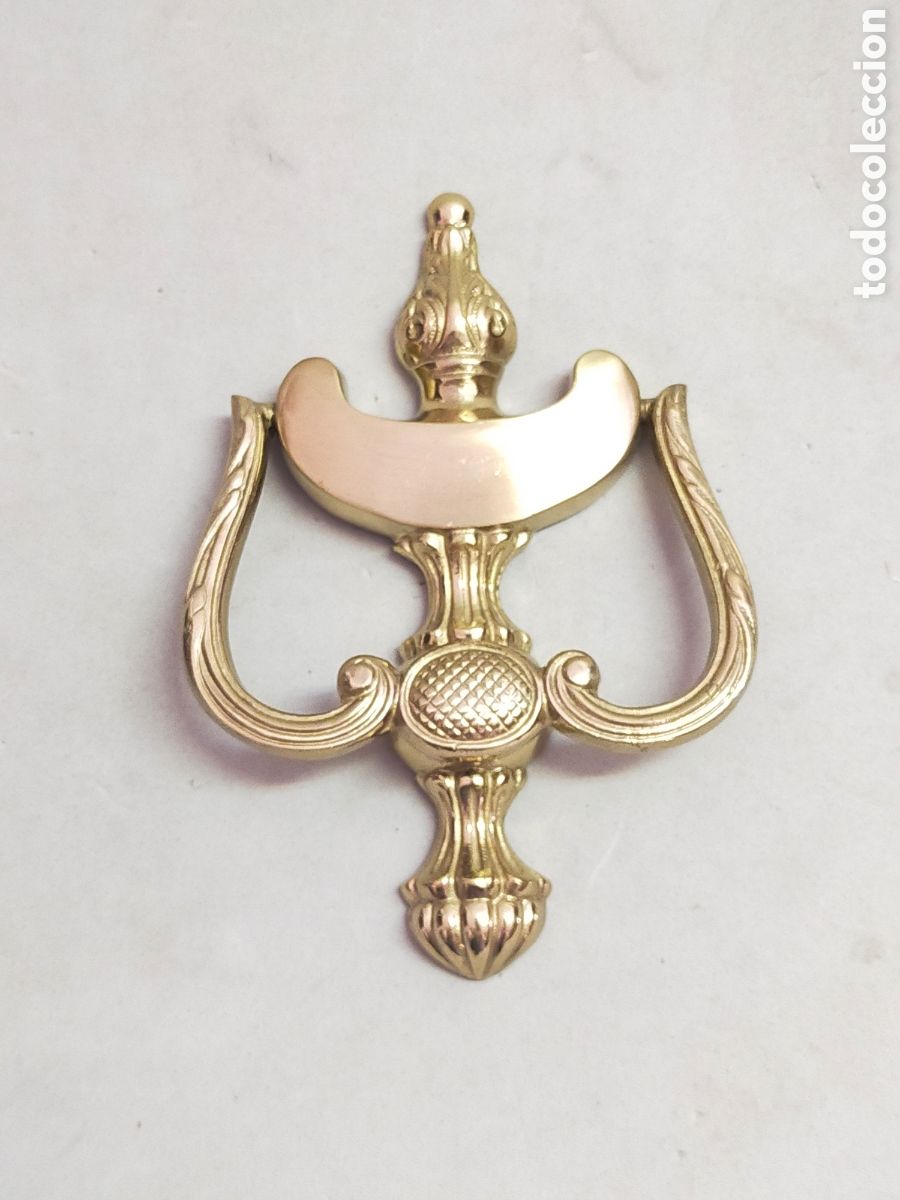 Antig&uuml;edades: LAMADOR DE BRONCE PARA PUERTA. - Foto 1