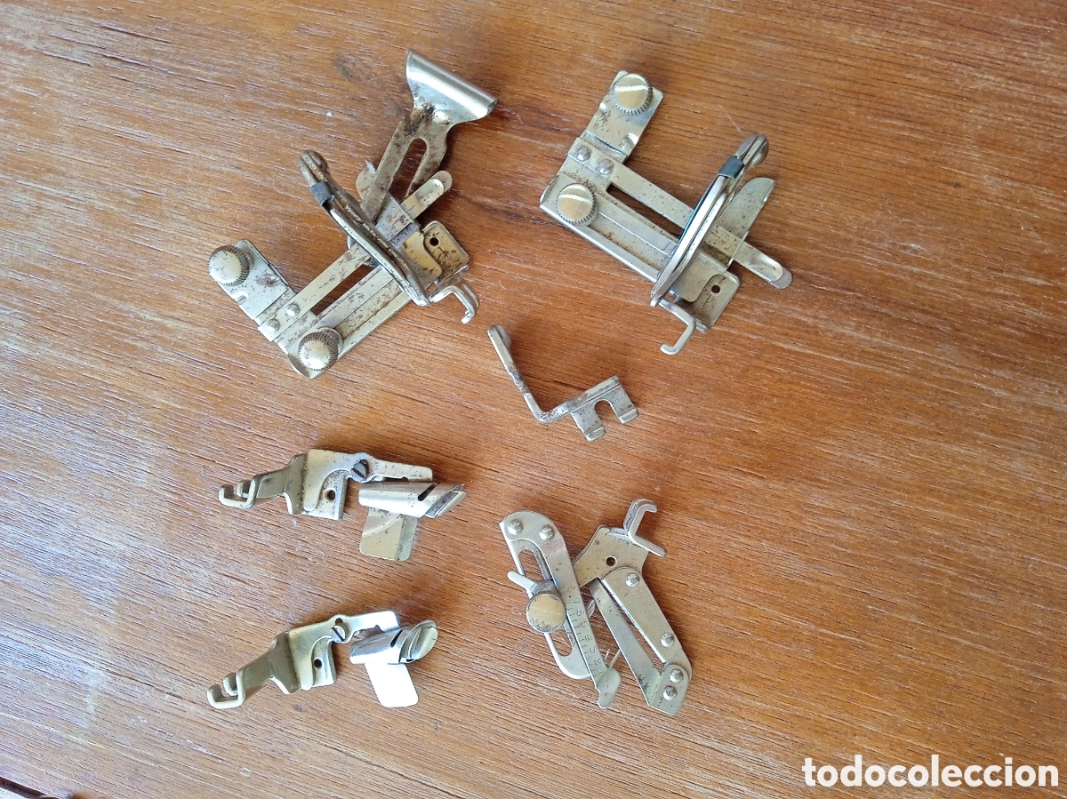 Antig&uuml;edades: Piezas de antiguas m&aacute;quinas de coser - Foto 1