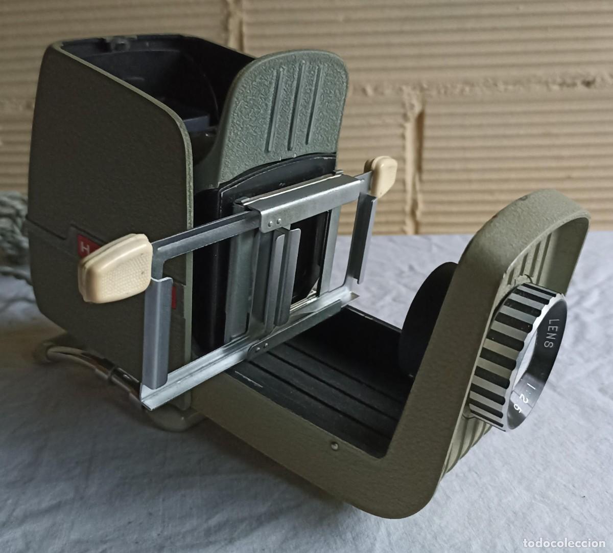 Antig&uuml;edades: Proyector de diapositivas Harmony, a&ntilde;os 60 - Foto 1