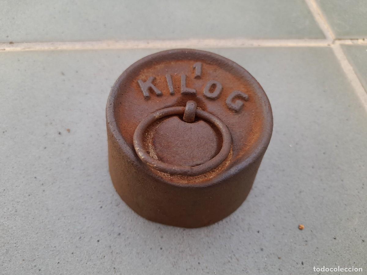 Antig&uuml;edades: pesa de hierro 1kg, 7x4,5cm aprox - Foto 1