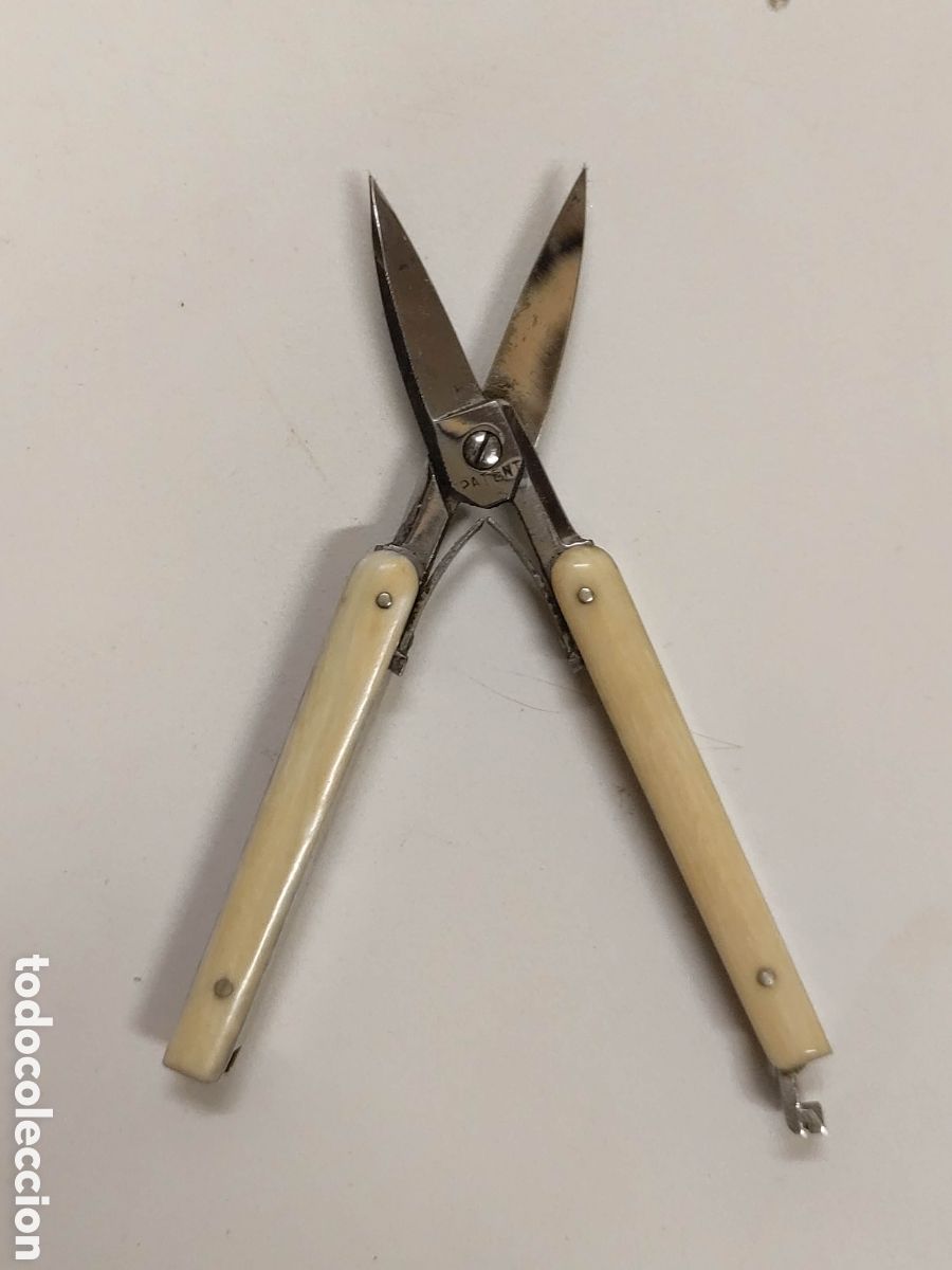Antig&uuml;edades: Tijera de bolso marfl plegable - Foto 1